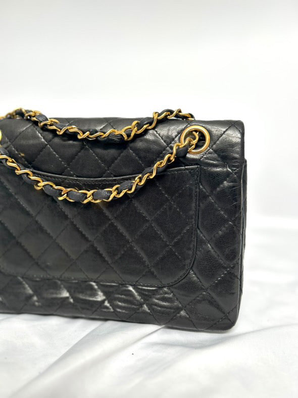 Chanel small vintage black quilted 24k gold plated hardware.
