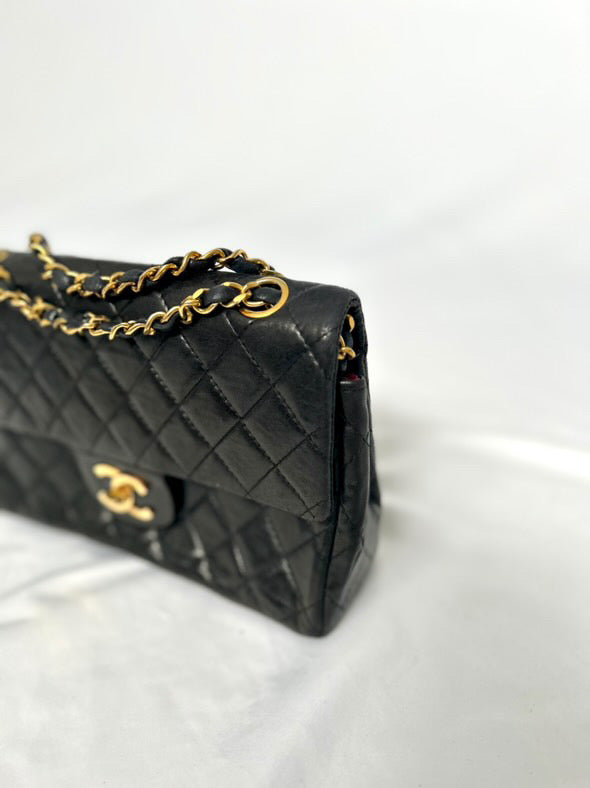 Chanel small vintage black quilted 24k gold plated hardware.