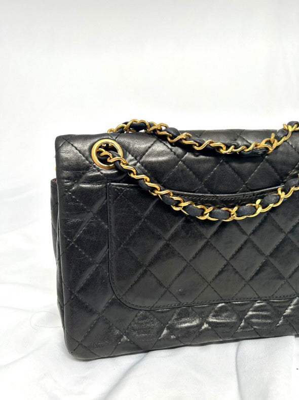 Chanel small vintage black quilted 24k gold plated hardware.