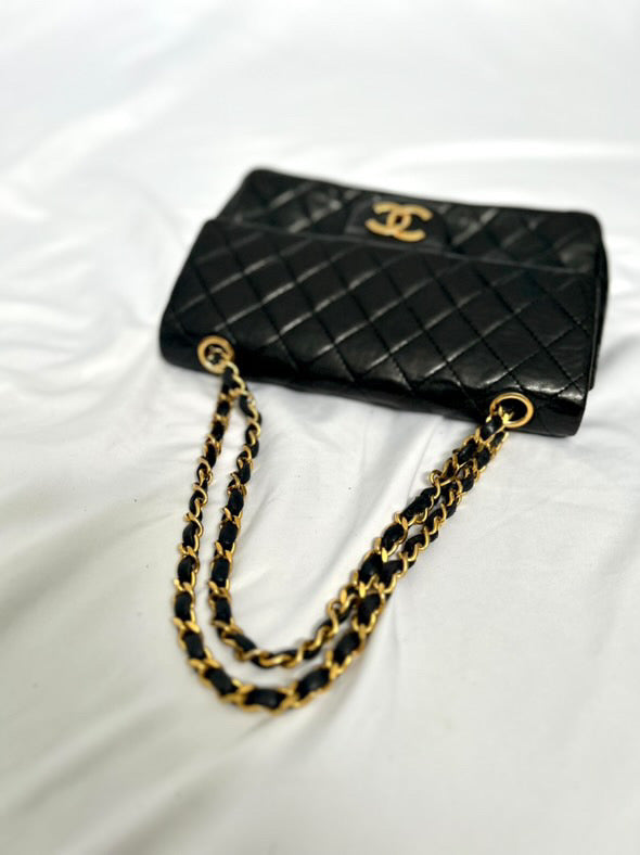 Chanel small vintage black quilted 24k gold plated hardware.