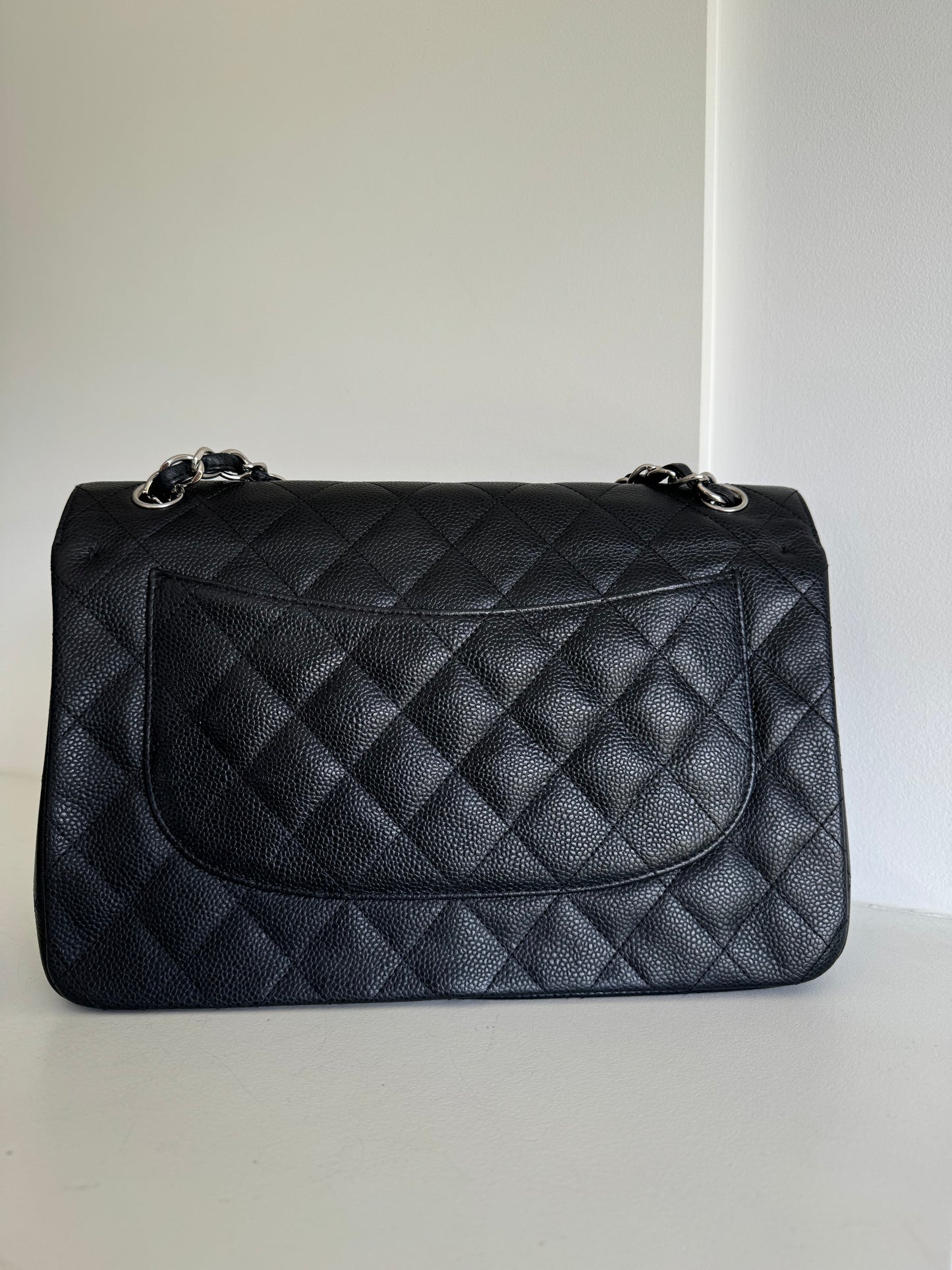 Chanel jumbo caviar double flap bag