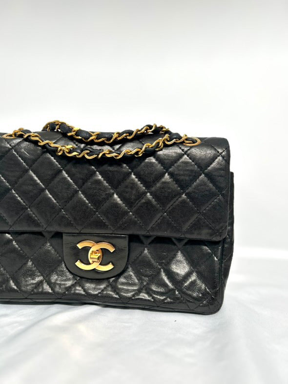Chanel small vintage black quilted 24k gold plated hardware.