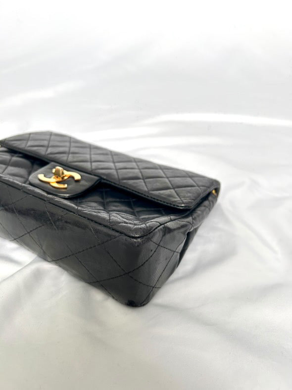 Chanel small vintage black quilted 24k gold plated hardware.