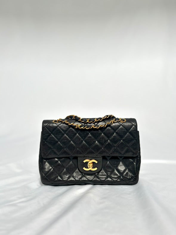 Chanel small vintage black quilted 24k gold plated hardware.