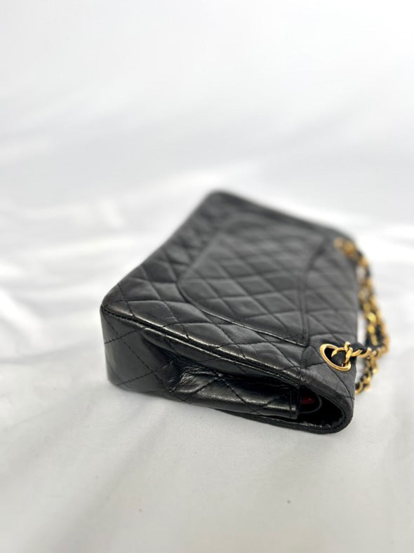 Chanel small vintage black quilted 24k gold plated hardware.