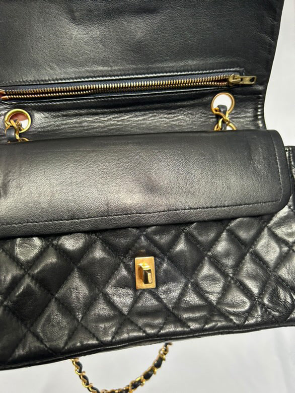 Chanel small vintage black quilted 24k gold plated hardware.