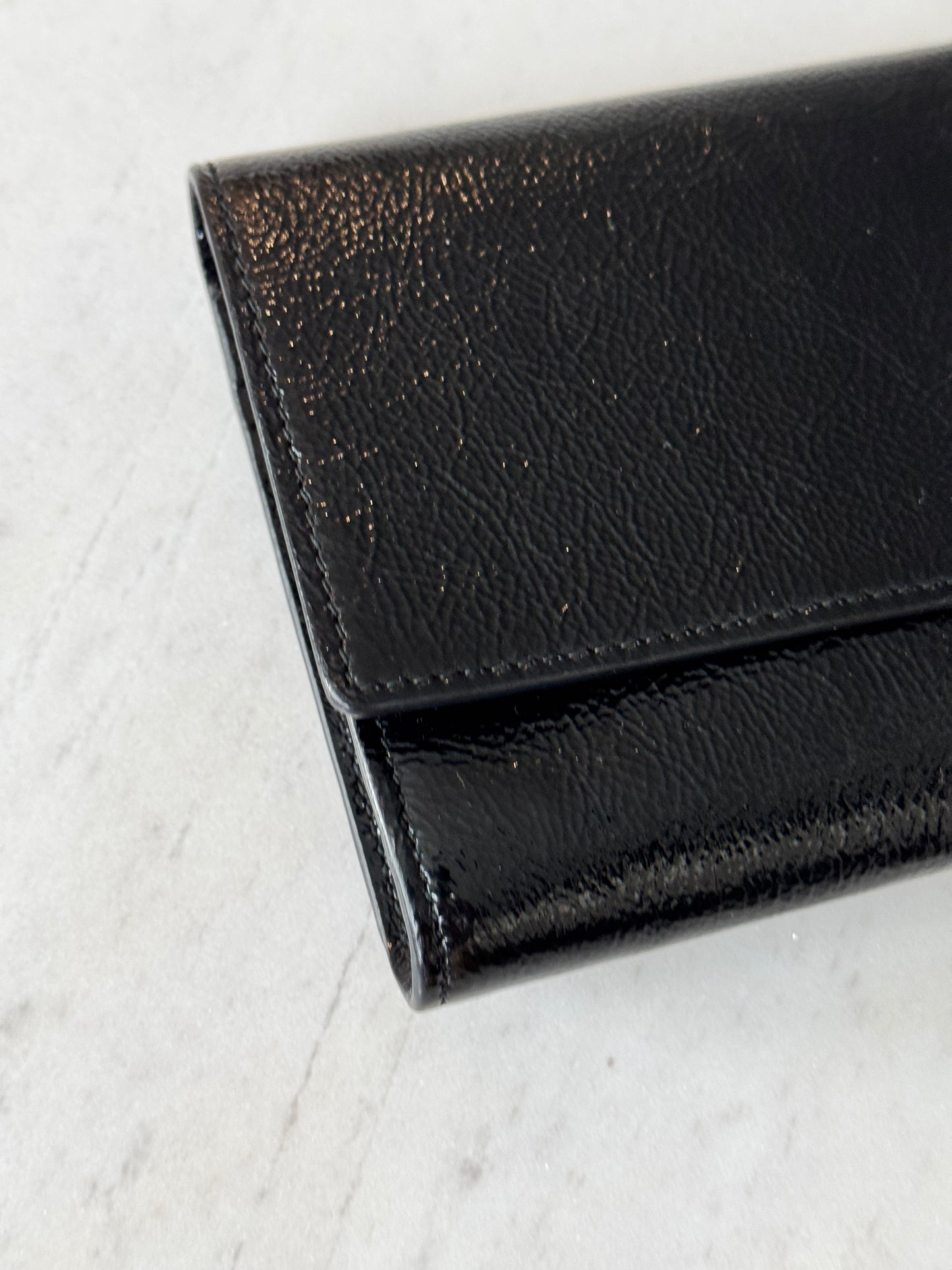 Saint Laurent black textured patent monogram belle de jour clutch
