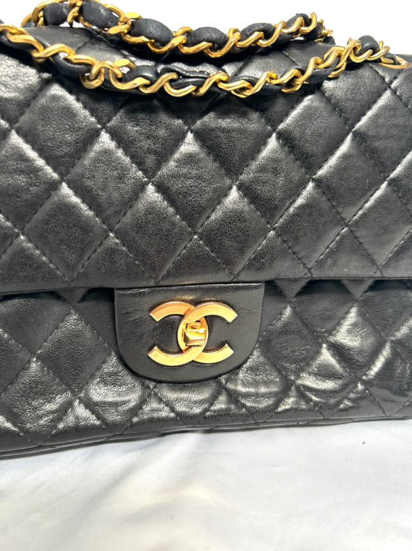 Chanel small vintage black quilted 24k gold plated hardware.