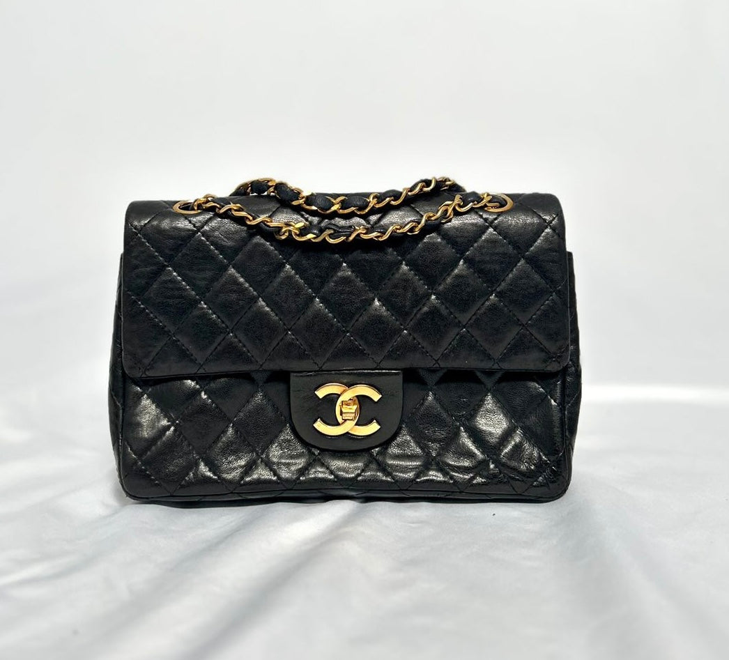 Chanel small vintage black quilted 24k gold plated hardware.