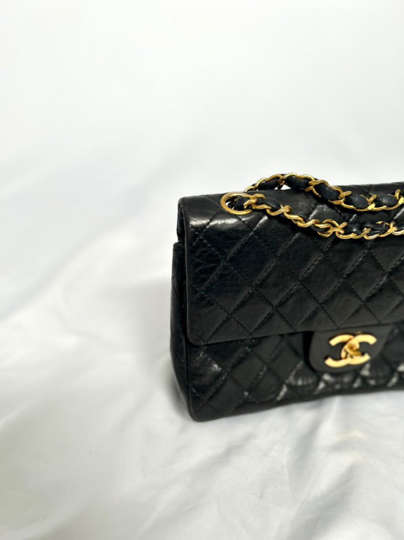 Chanel small vintage black quilted 24k gold plated hardware.