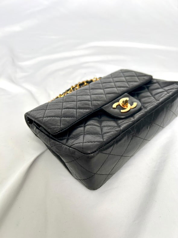 Chanel small vintage black quilted 24k gold plated hardware.