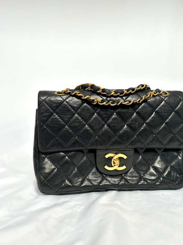 Chanel small vintage black quilted 24k gold plated hardware.