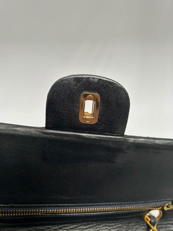 Chanel small vintage black quilted 24k gold plated hardware.