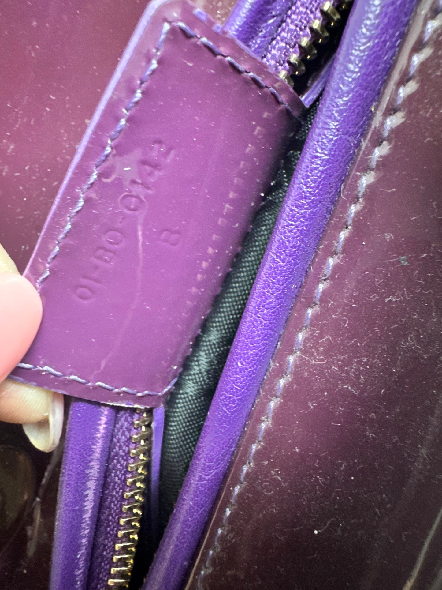 Christian Dior medium Lady, dark purple with signature Cannage stitching