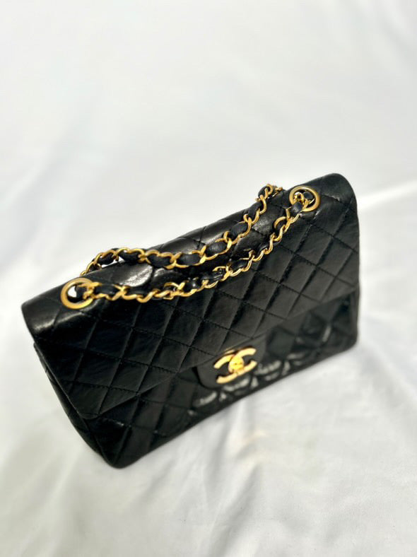 Chanel small vintage black quilted 24k gold plated hardware.