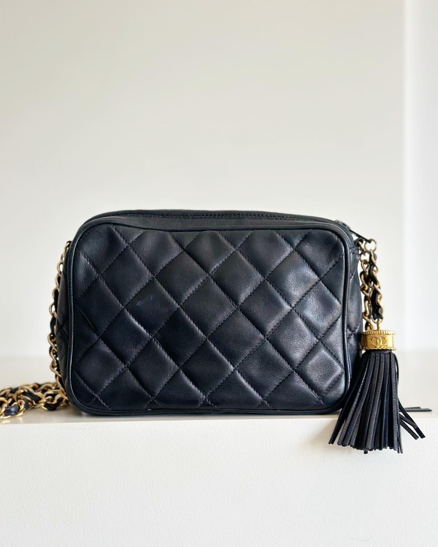 Chanel vintage camera bag with tassel, navy blue leather