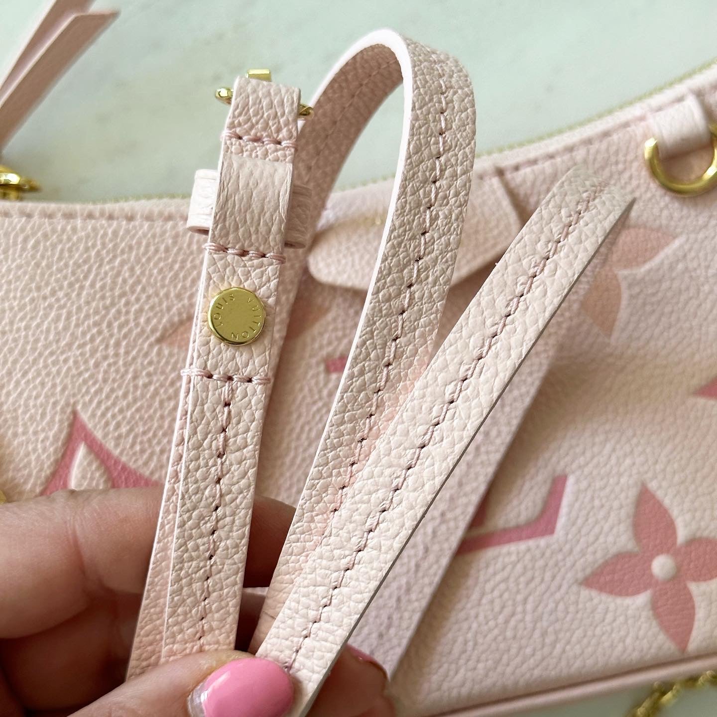 Louis Vuitton Easy Pouch Monogram Empreinte leather. Gradient collection.