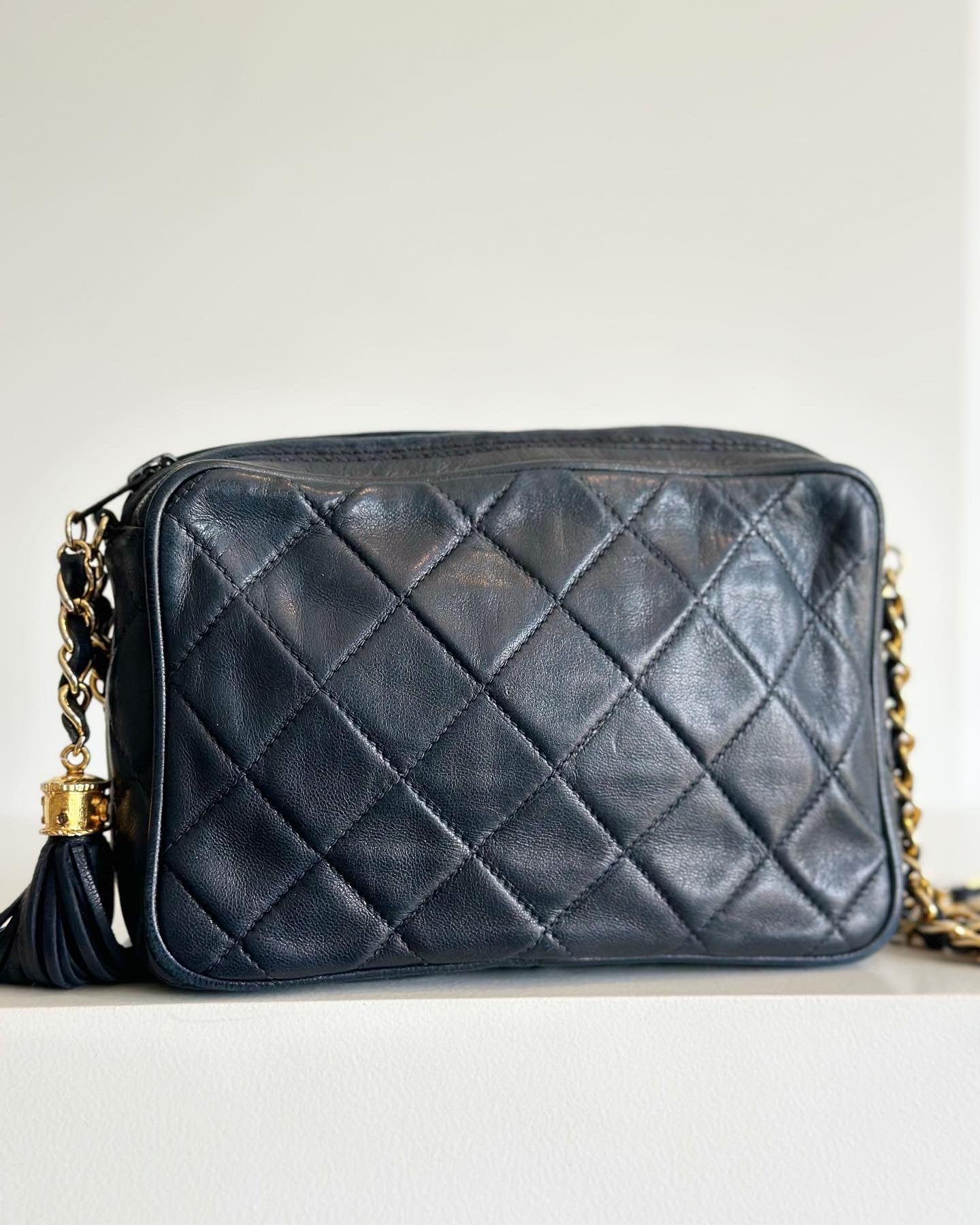 Chanel vintage camera bag with tassel, navy blue leather