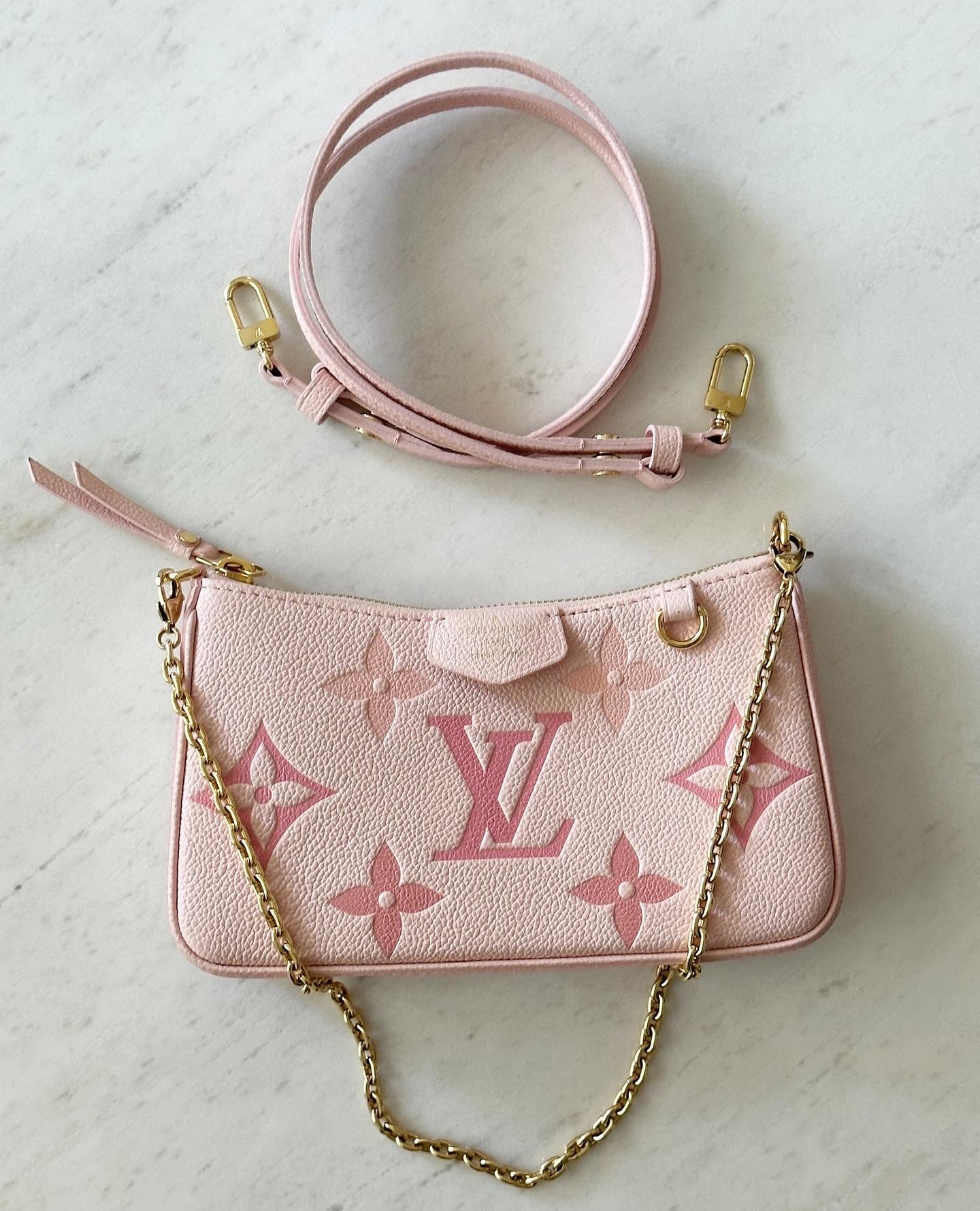 Louis Vuitton Easy Pouch Monogram Empreinte leather. Gradient collection.