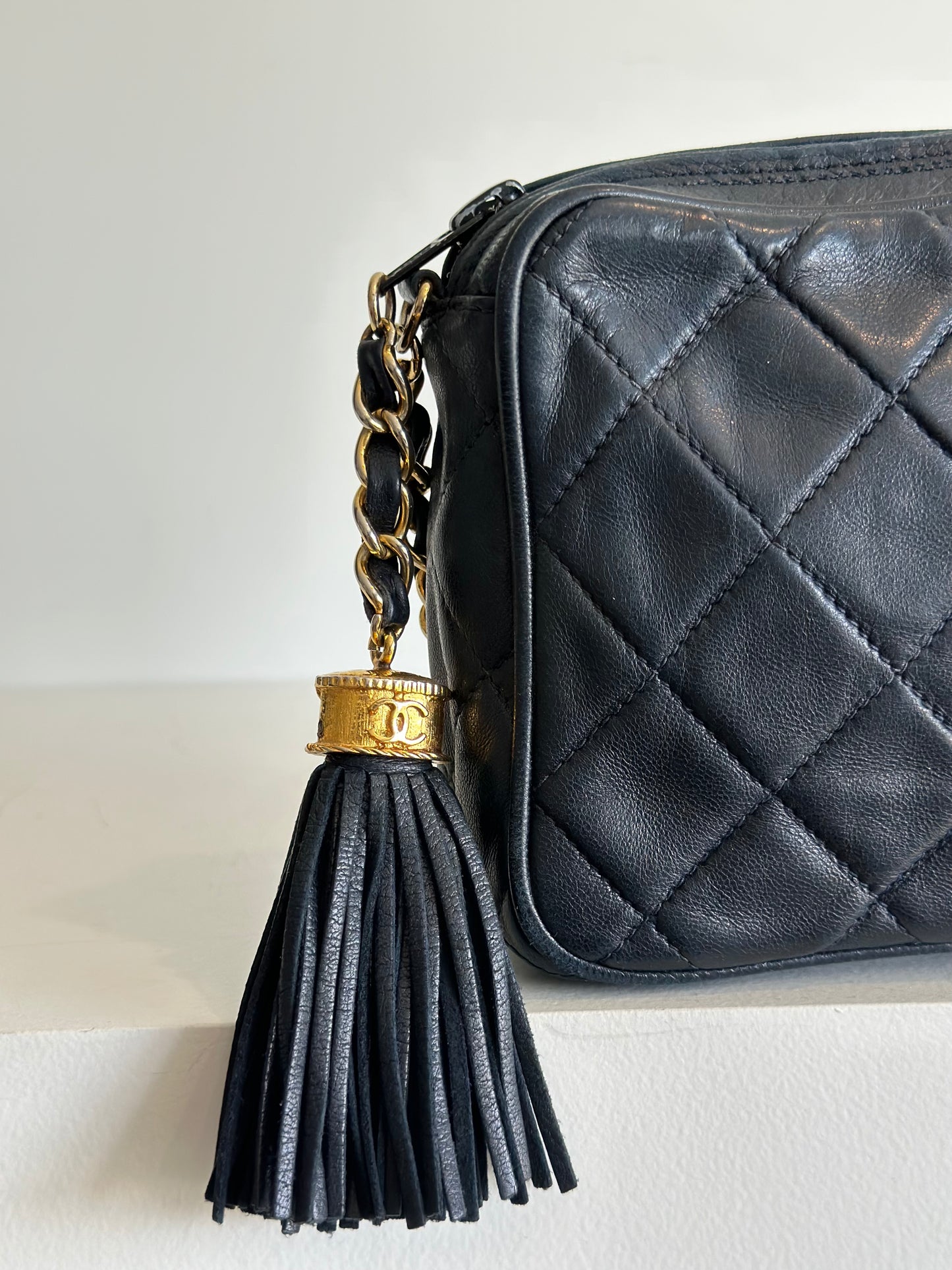 Chanel vintage camera bag with tassel, navy blue leather