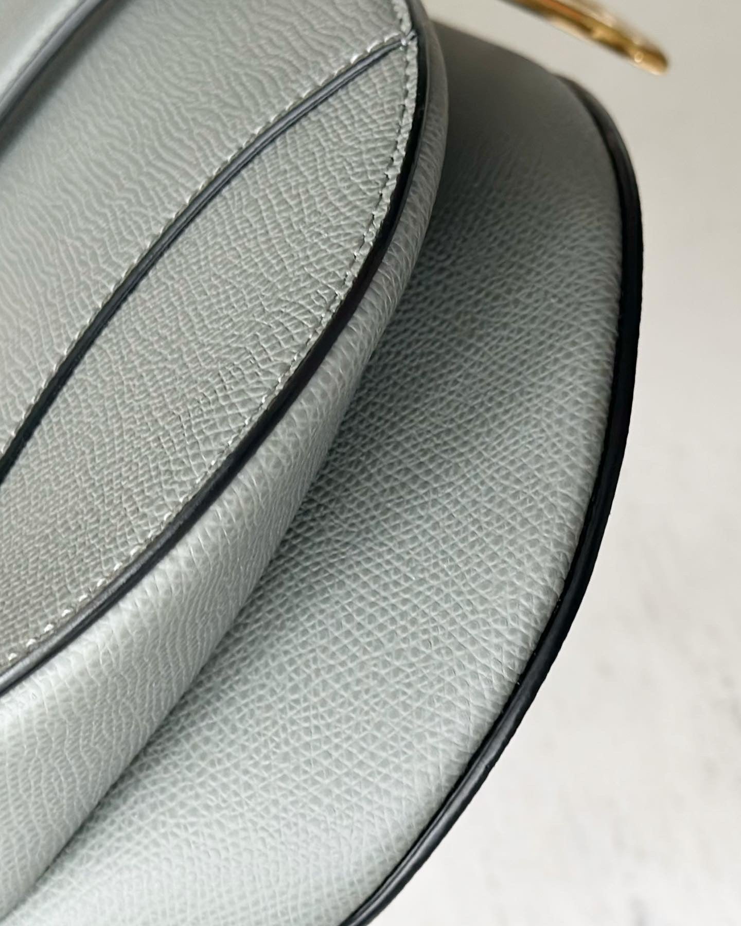 Christian Dior Medium Sage Green Grained calfskin saddle bag.