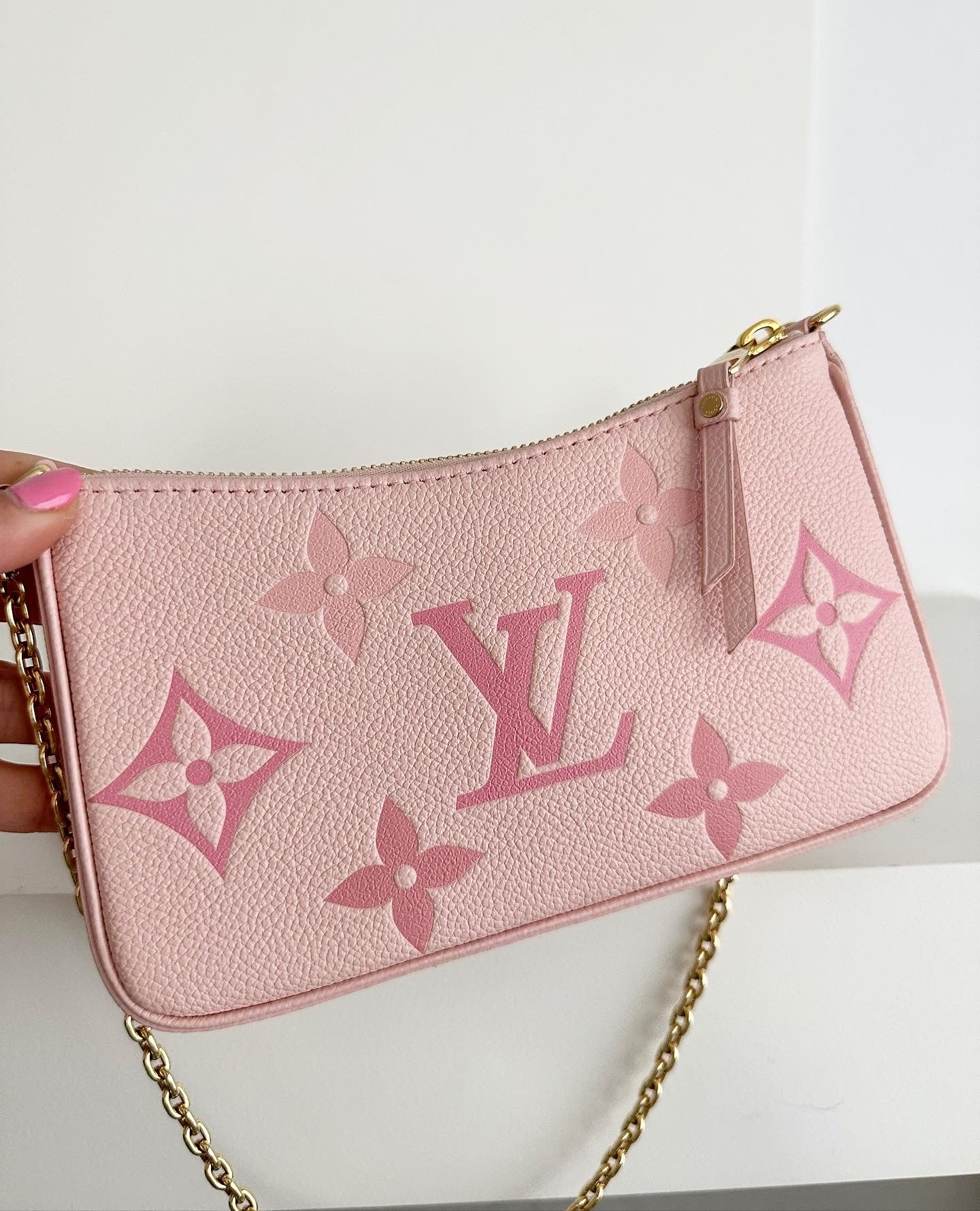 Louis Vuitton Easy Pouch Monogram Empreinte leather. Gradient collection.