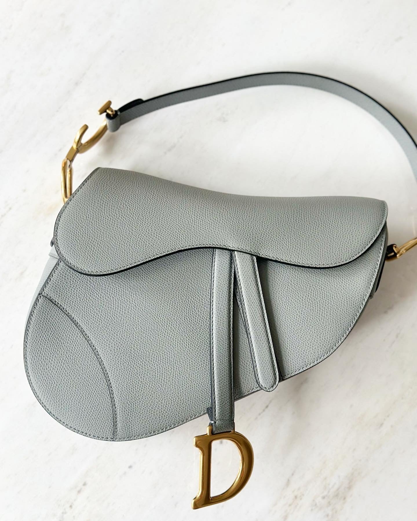 Christian Dior Medium Sage Green Grained calfskin saddle bag.