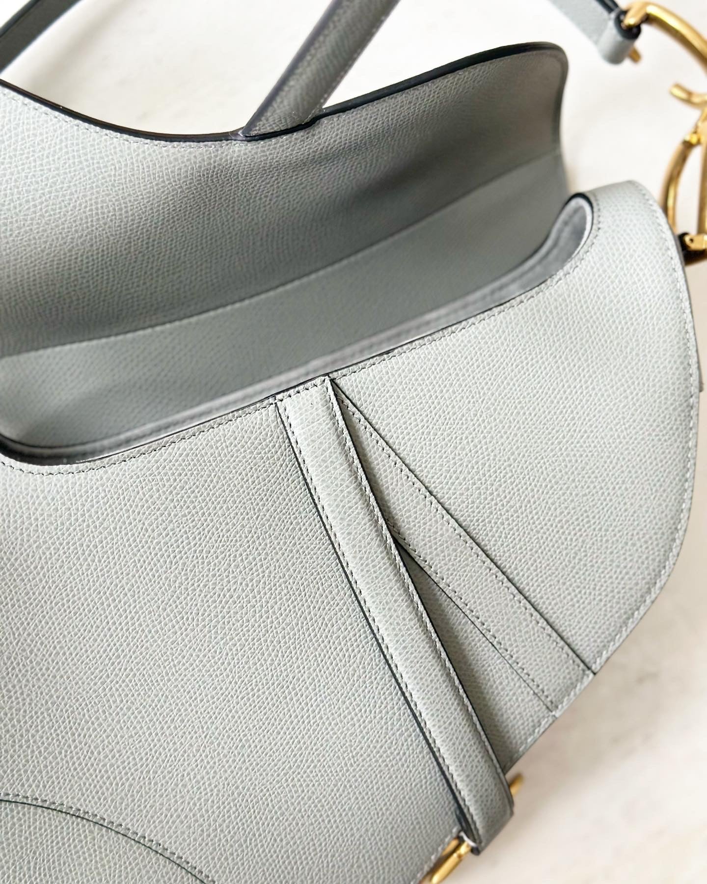 Christian Dior Medium Sage Green Grained calfskin saddle bag.