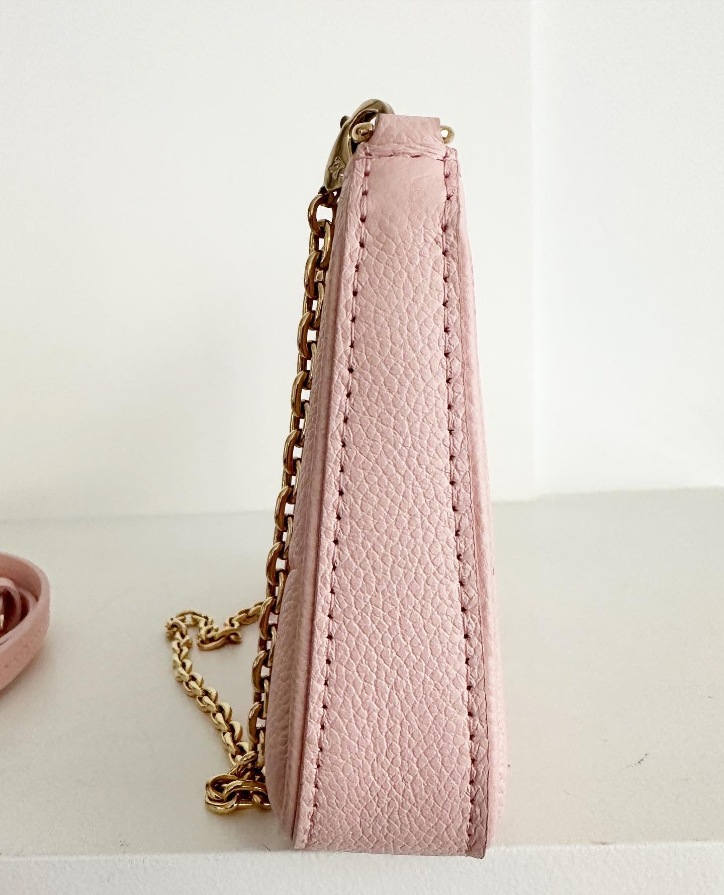 Louis Vuitton Easy Pouch Monogram Empreinte leather. Gradient collection.