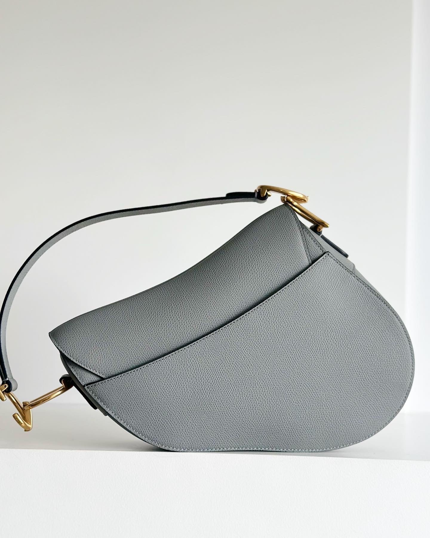 Christian Dior Medium Sage Green Grained calfskin saddle bag.