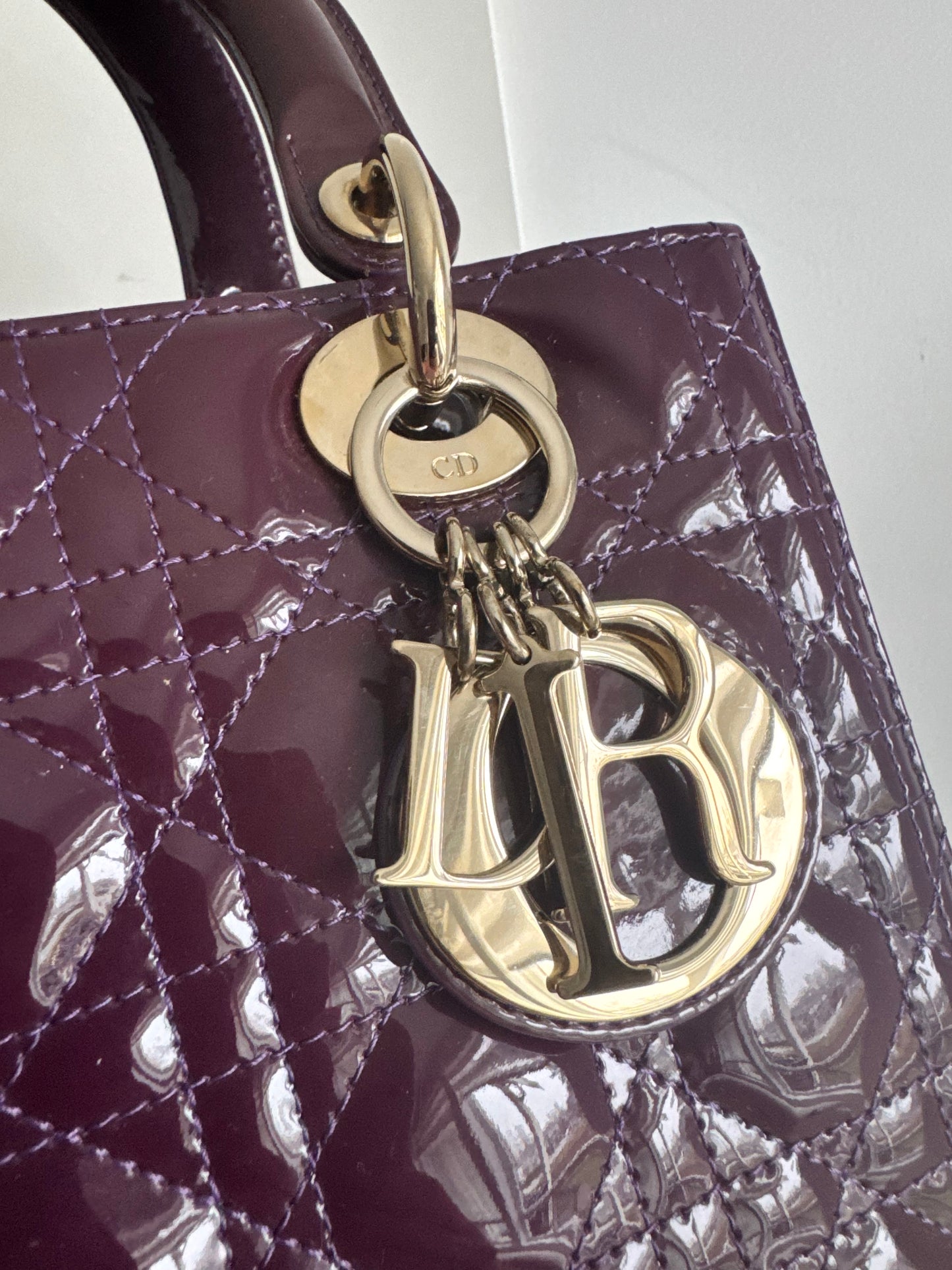 Christian Dior medium Lady, dark purple with signature Cannage stitching