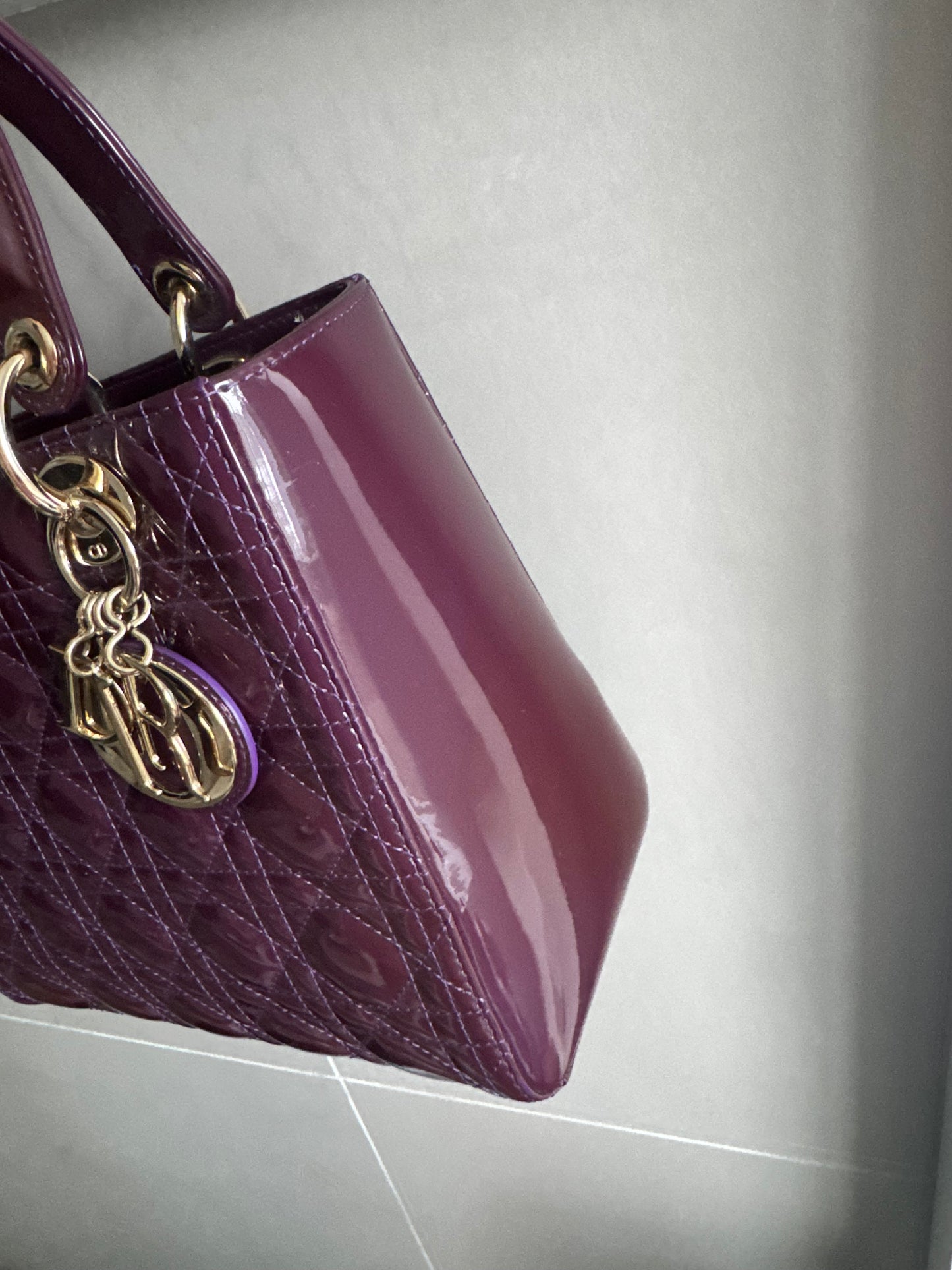Christian Dior medium Lady, dark purple with signature Cannage stitching