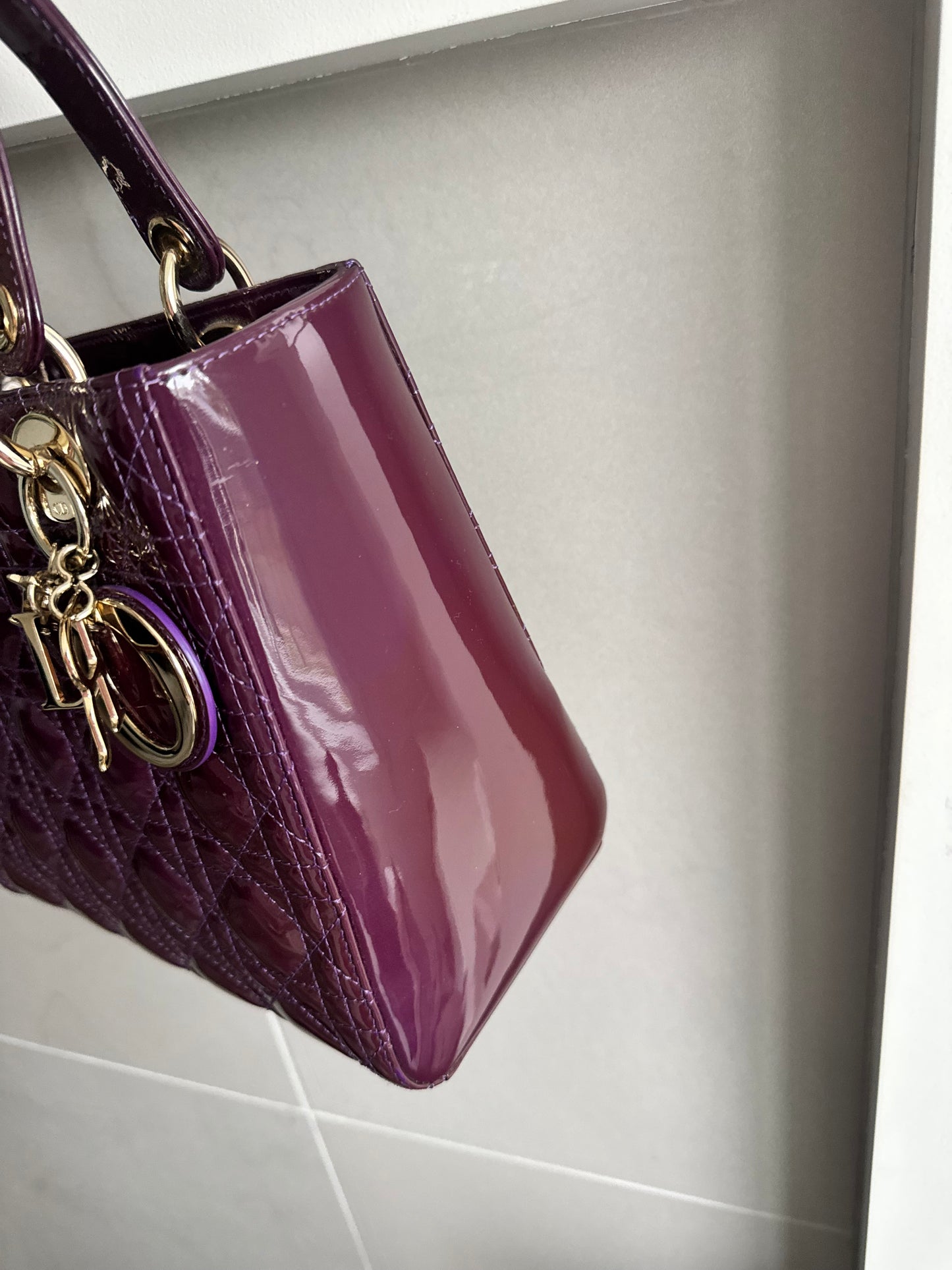 Christian Dior medium Lady, dark purple with signature Cannage stitching