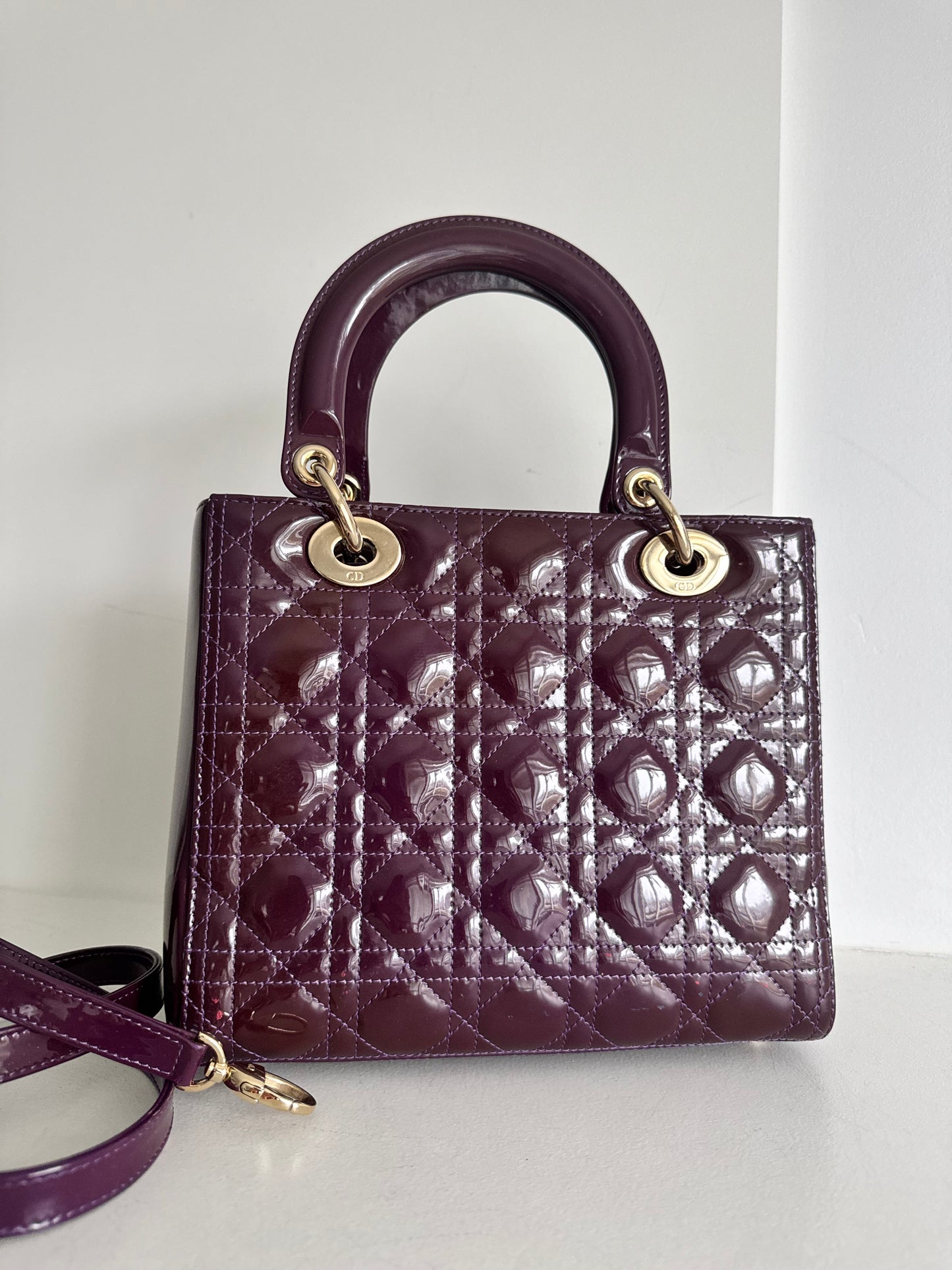 Christian Dior medium Lady, dark purple with signature Cannage stitching