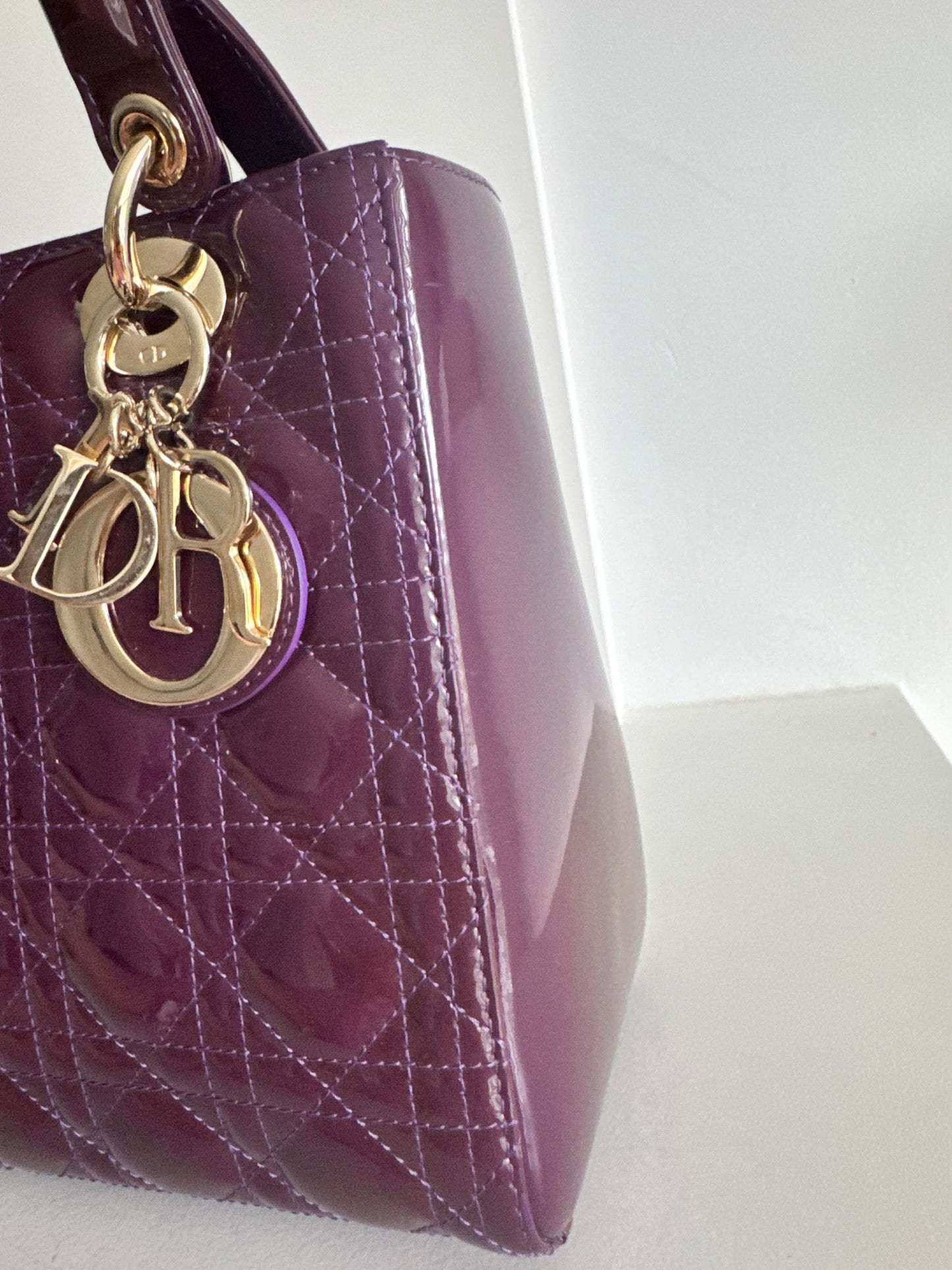 Christian Dior medium Lady, dark purple with signature Cannage stitching