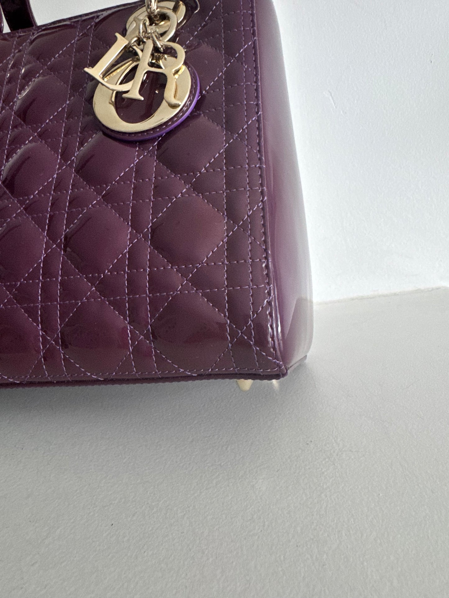Christian Dior medium Lady, dark purple with signature Cannage stitching