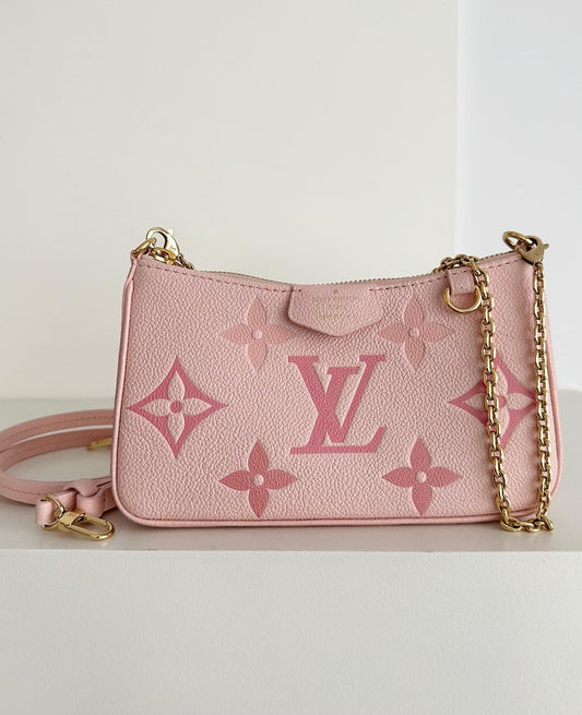 Louis Vuitton Easy Pouch Monogram Empreinte leather. Gradient collection.