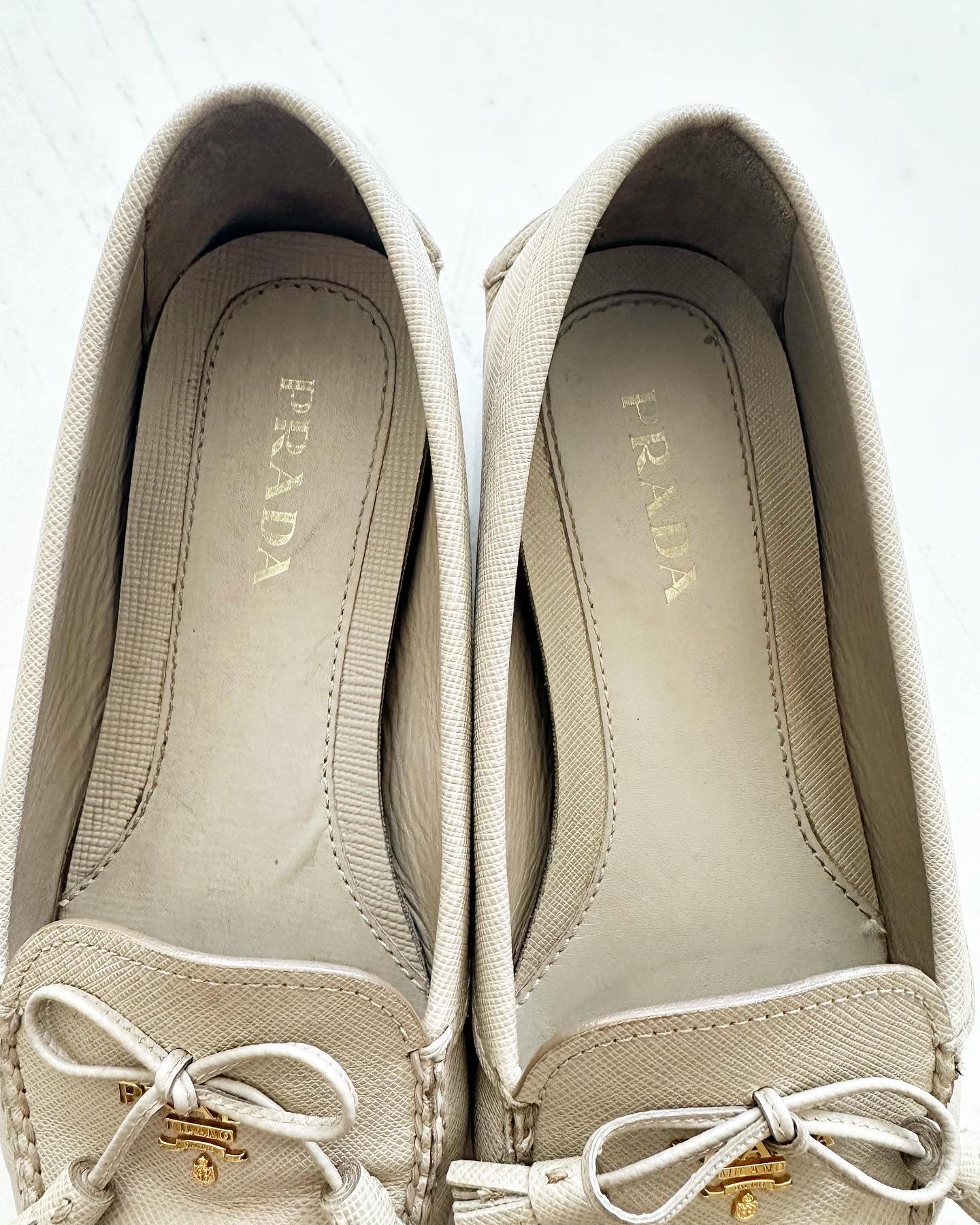 Prada leather bow slip on loafers